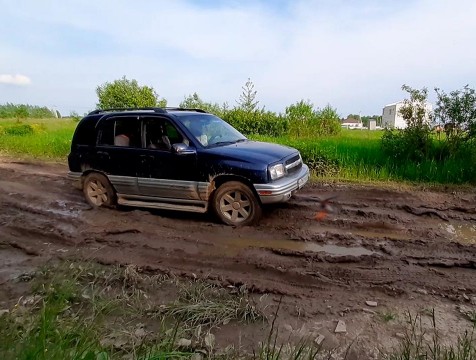Дорогу в посёлки для многодетных отремонтируют за счёт остатков стройматериалов Северного обхода
